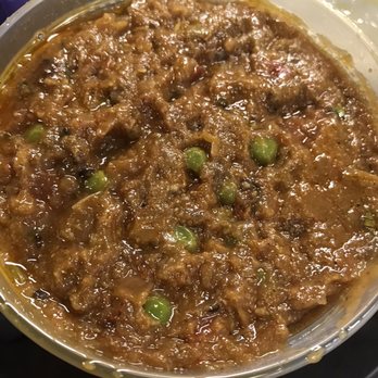 Ekta Indian Cuisine signature dishes Chicken KormaLamb Rogan JoshBaingan Bharta